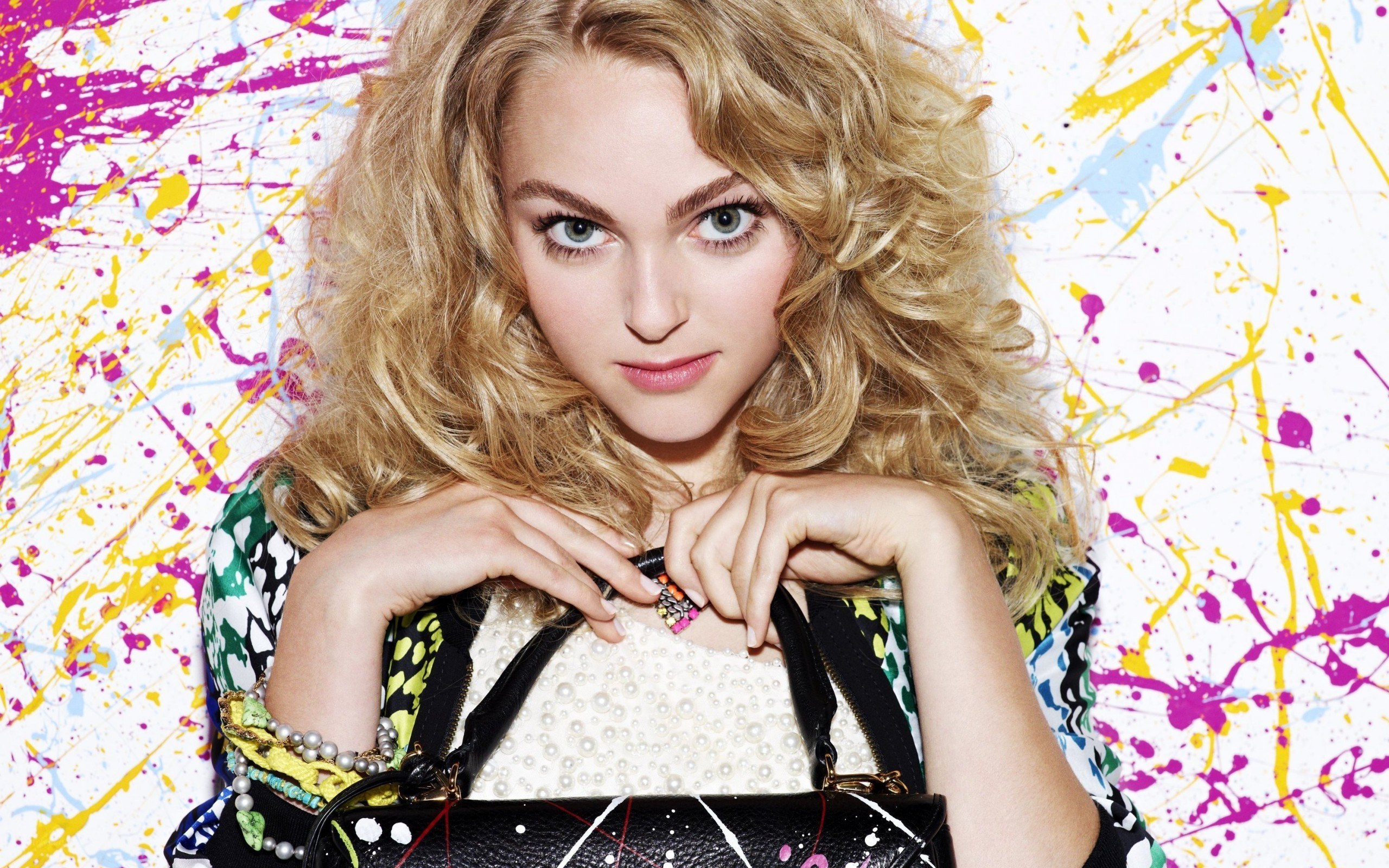 woman with colorful splatter background