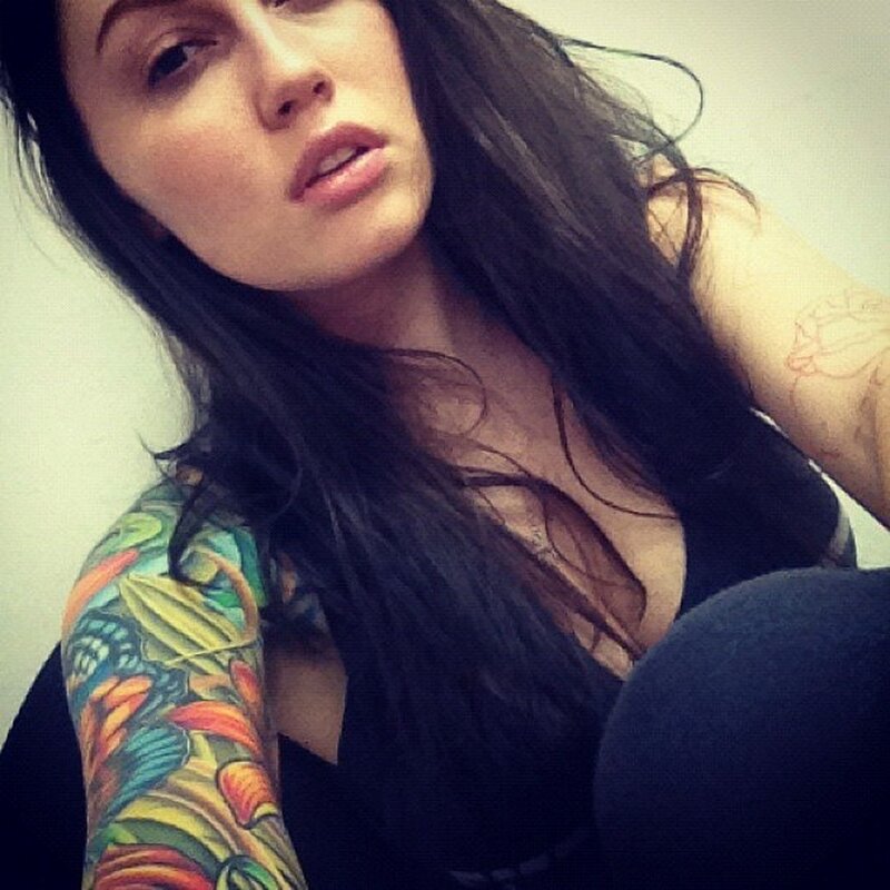 woman with colorful tattoo