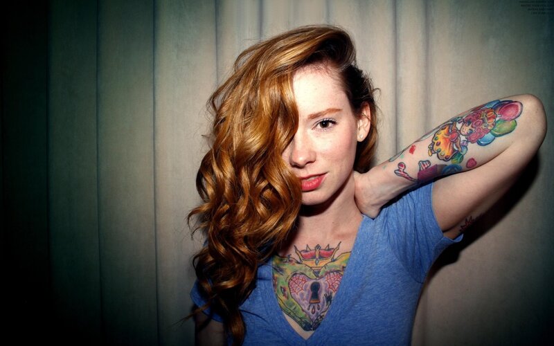 woman with colorful tattoos