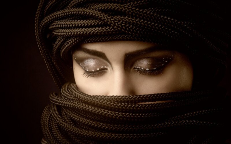 Woman with Covered Face — Brown, Dramatic