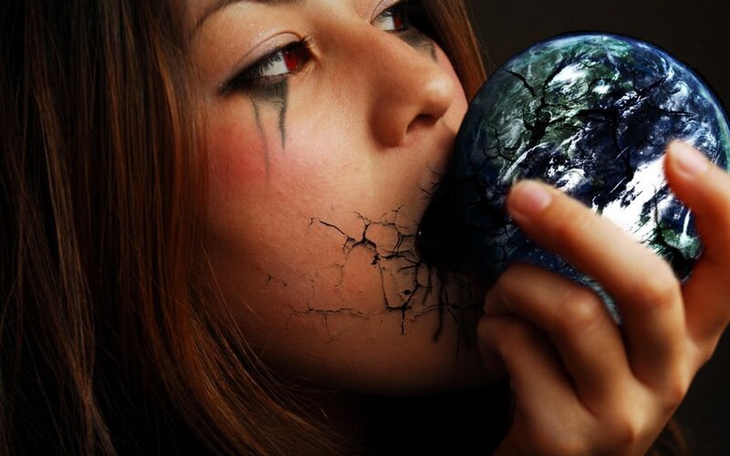 woman with cracked earth ball