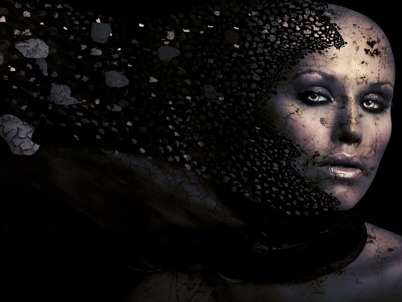 woman with cracked face and veil