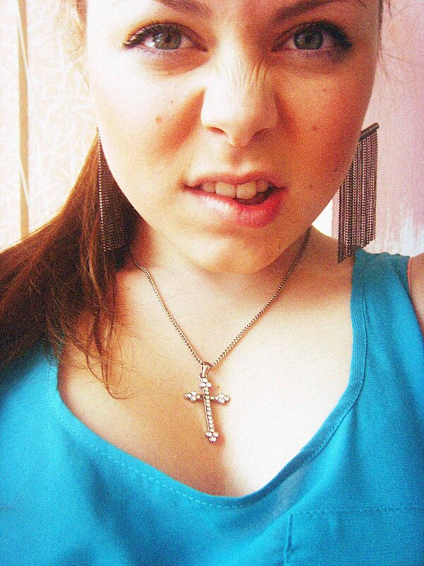 woman with cross necklace