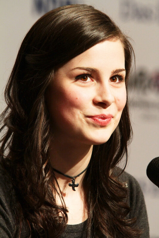 woman with cross necklace