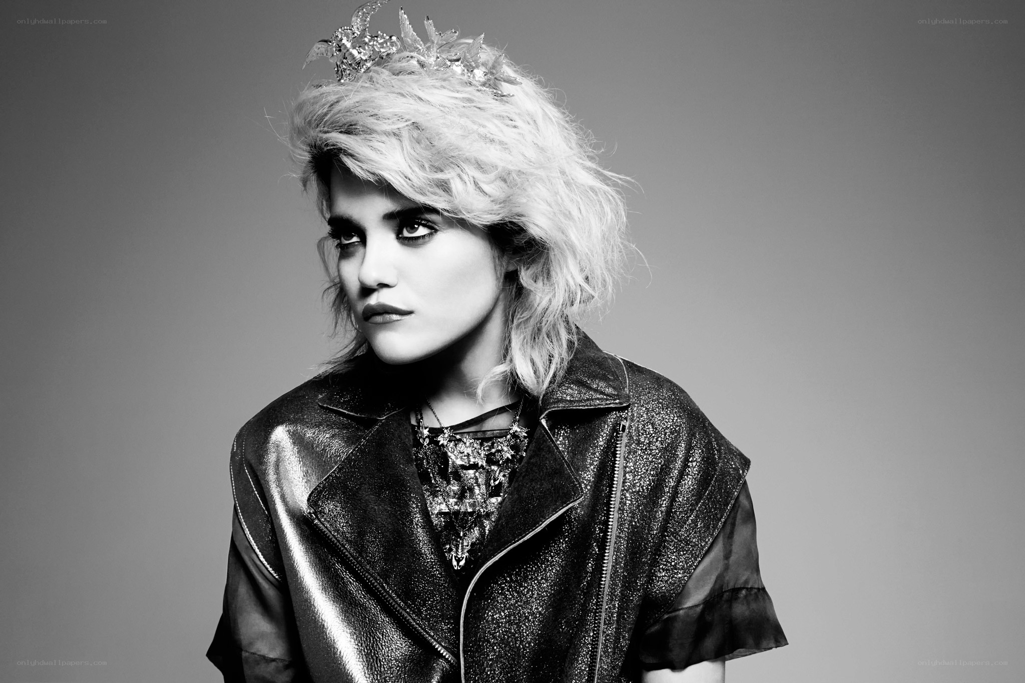 woman with crown and leather jacket