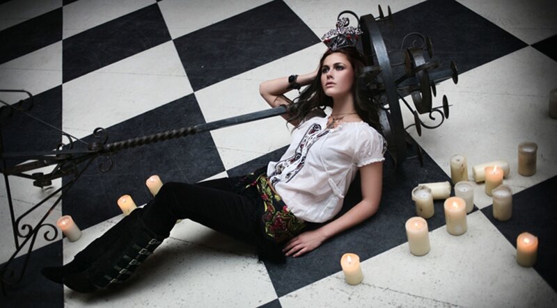 Woman with Crown on Floor