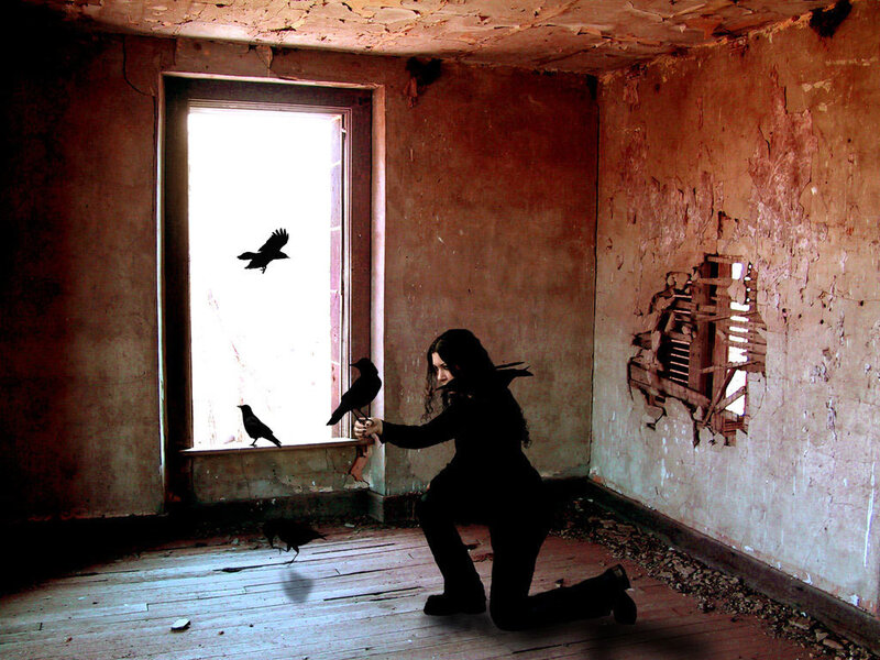 woman with crows in abandoned room