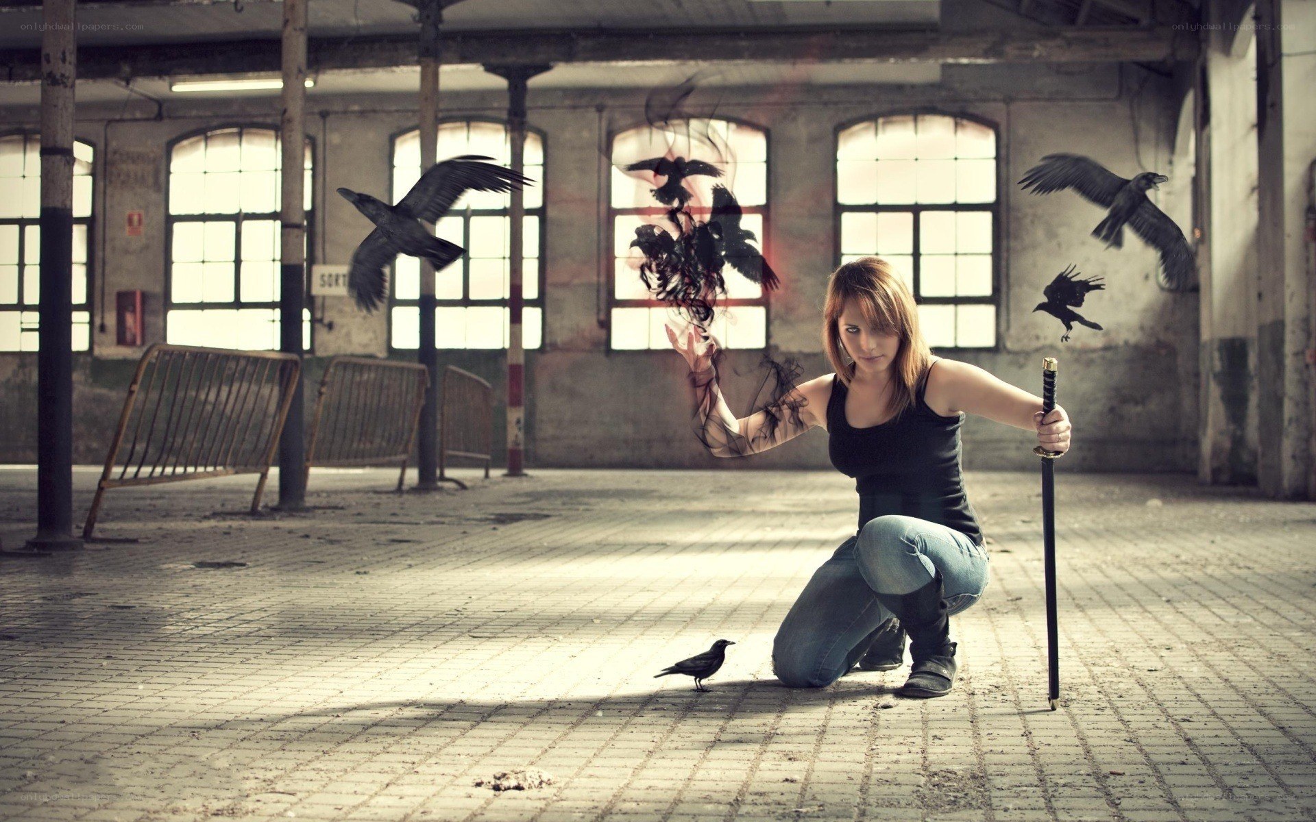 Woman with crows in warehouse
