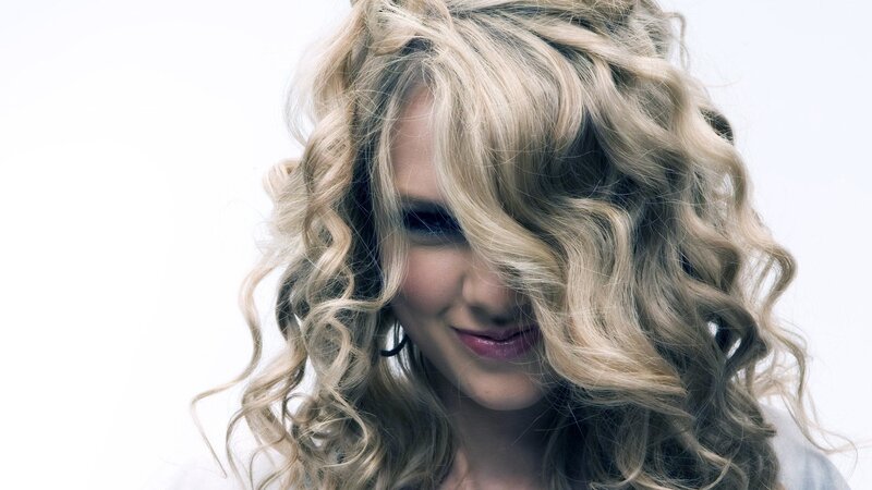 woman with curly blonde hair