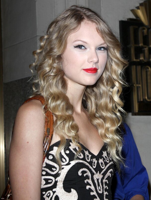 woman with curly blonde hair