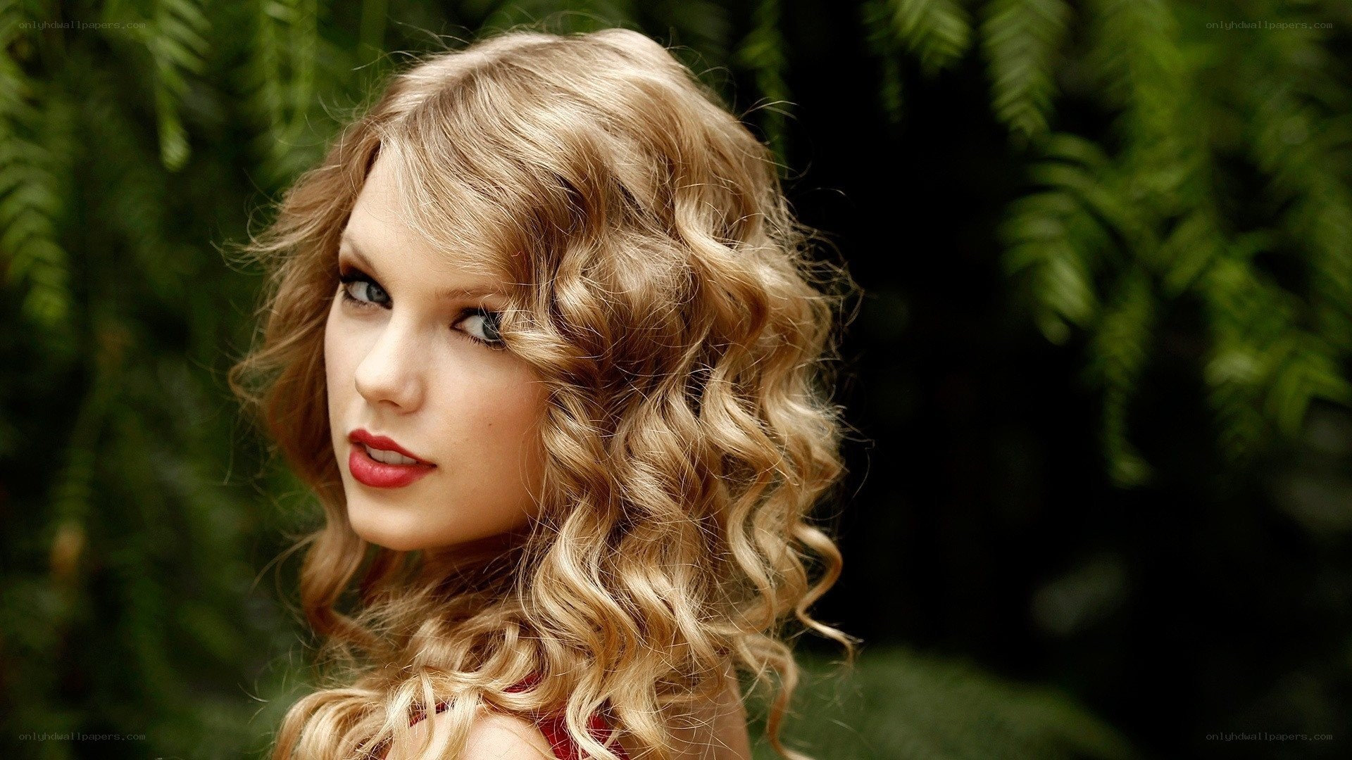 woman with curly blonde hair