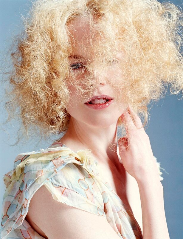 Woman with Curly Blonde Hair — Blue, Calm