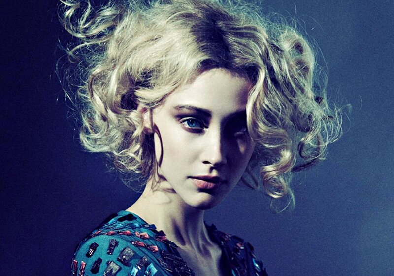 Woman with Curly Blonde Hair — Blue, Dramatic, Photograph