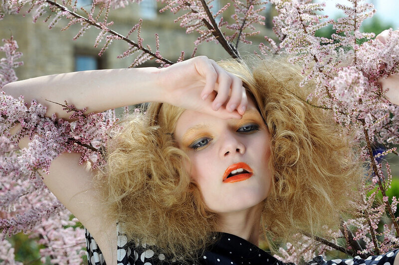 Woman with Curly Blonde Hair — Dramatic, Spring