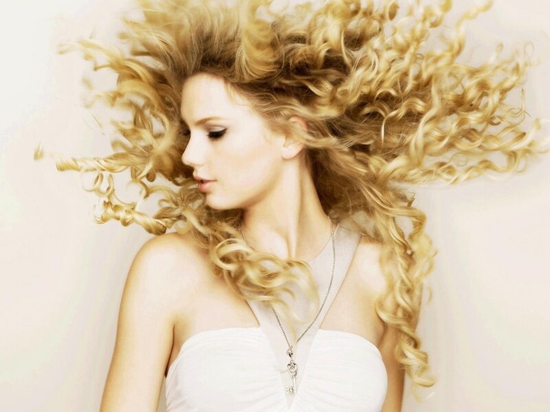 Woman with Curly Blonde Hair — Dramatic