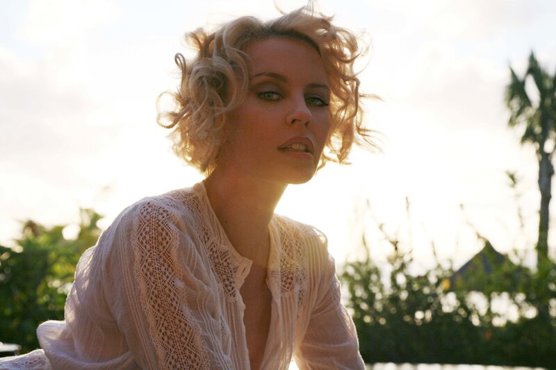 Woman with Curly Blonde Hair — White, Serene, Sunset