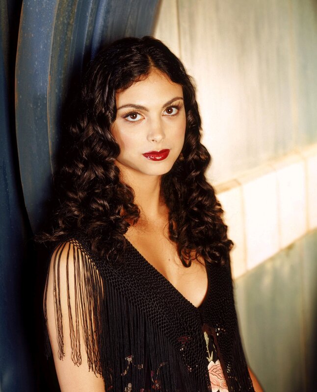woman with curly hair and red lipstick