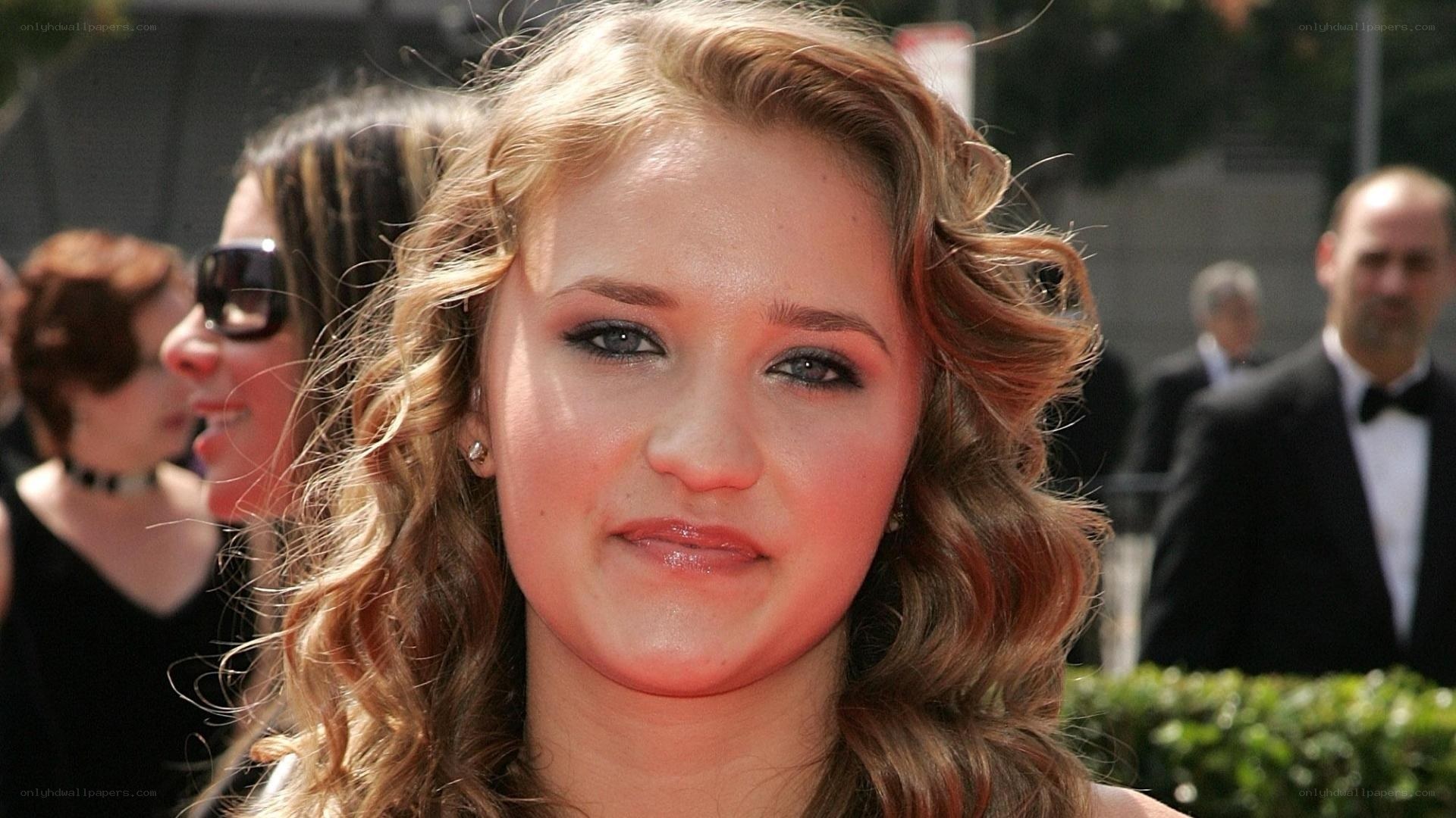 woman with curly hair at event