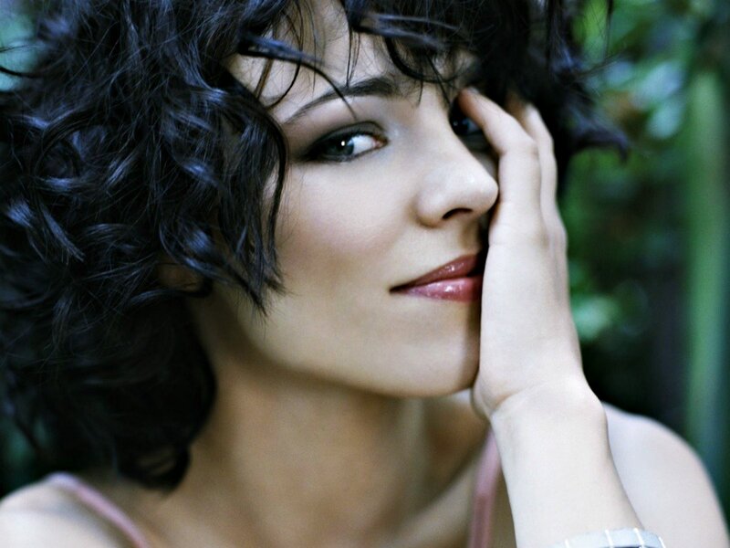 Woman with Curly Hair — Black, Contemplative, Photograph, Hand, Greenery