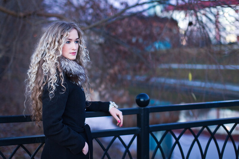 Woman with Curly Hair — Black, Contemplative, Winter