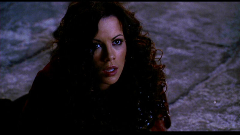 Woman with Curly Hair — Black, Dramatic, Night, Photograph