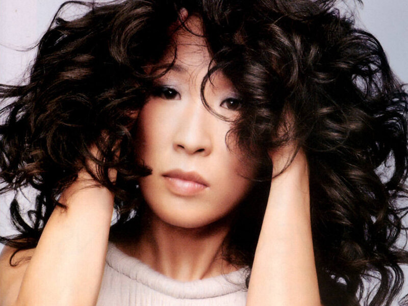 Woman with Curly Hair — Black, Neutral, Photograph, Hands