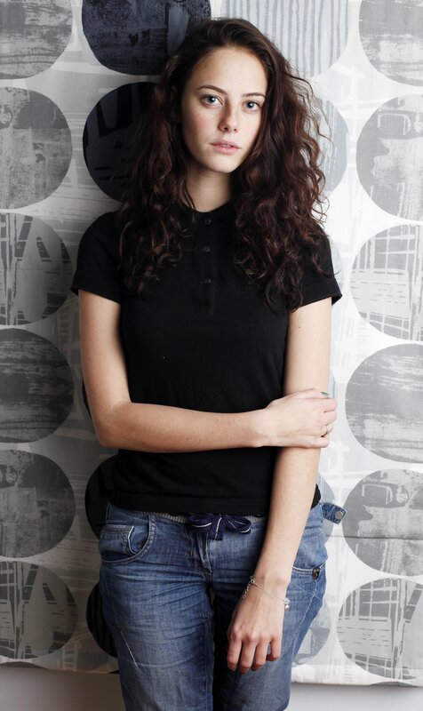 Woman with Curly Hair — Black, Neutral, Photograph, Polo Shirt