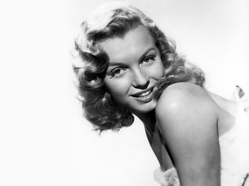 Woman with Curly Hair — Black, Smiling, Photograph
