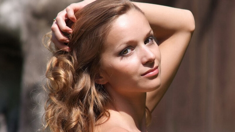 Woman with Curly Hair — Brown, Calm, Afternoon