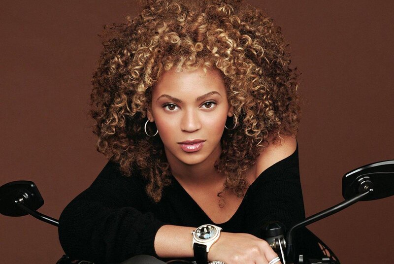 Woman with Curly Hair — Brown, Confident, Photograph, Motorcycle Handlebars
