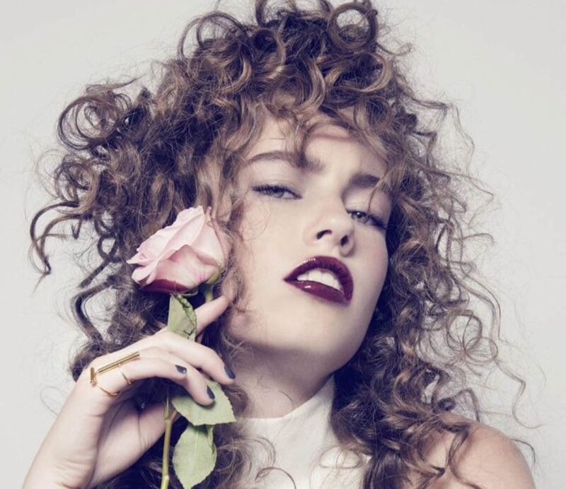 Woman with Curly Hair — Brown, Dramatic, Photograph, Rose