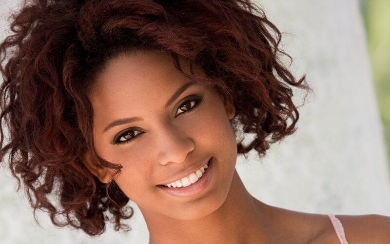 Woman with Curly Hair — Brown, Friendly, Photograph, Shoulder