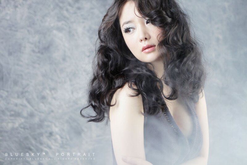Woman with Curly Hair — Gray, Dramatic, Photograph, Curly Hair, Dress