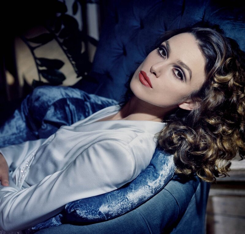 woman with curly hair lying down