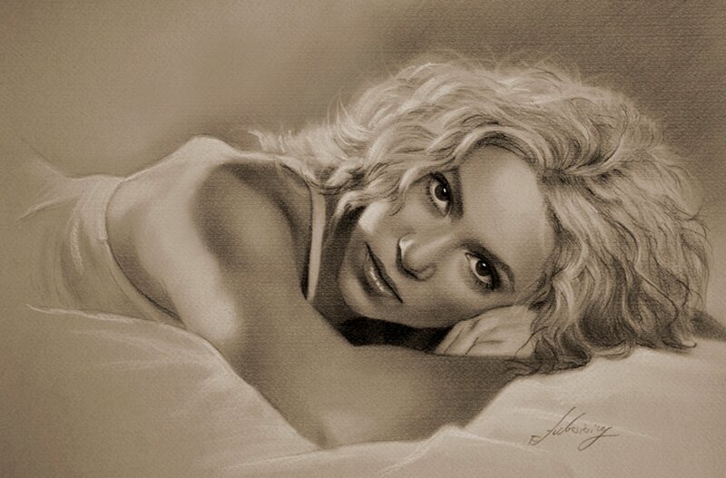 woman with curly hair lying down