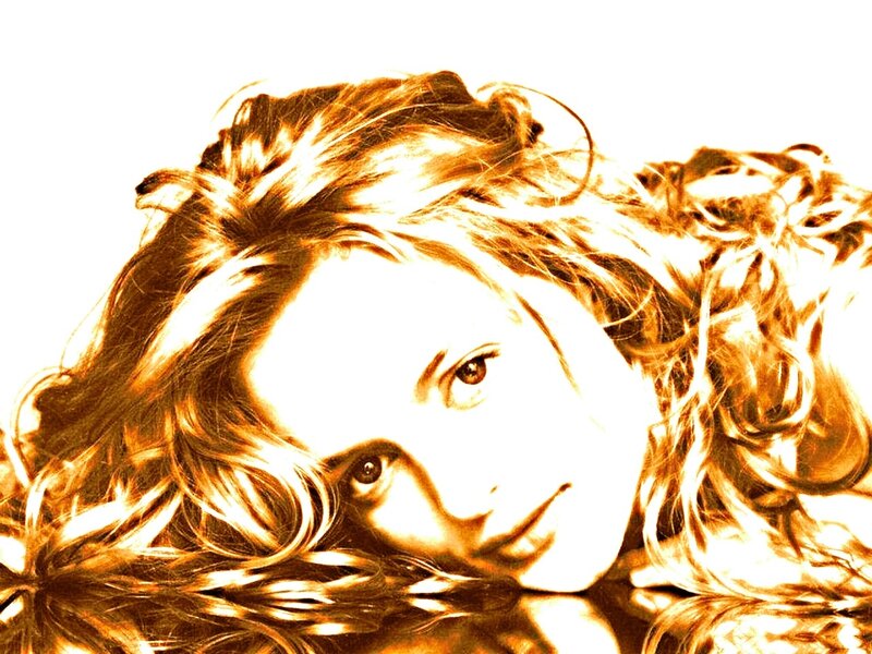 woman with curly hair lying down