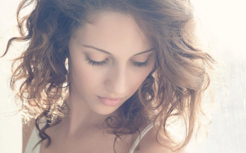 Woman with Curly Hair — White, Serene, Photograph, Shoulder