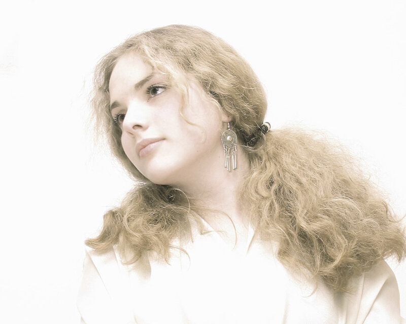 Woman with Curly Hair — White, Serene, Photograph
