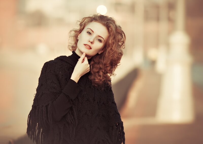 Woman with Curly Red Hair — Black, Contemplative