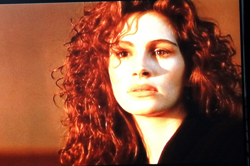 Woman with Curly Red Hair — Dramatic, Sunset