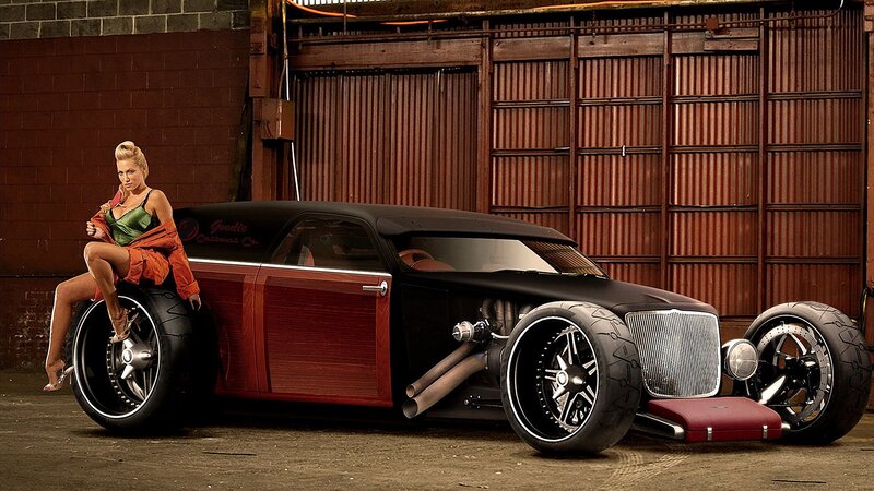 woman with custom hot rod car