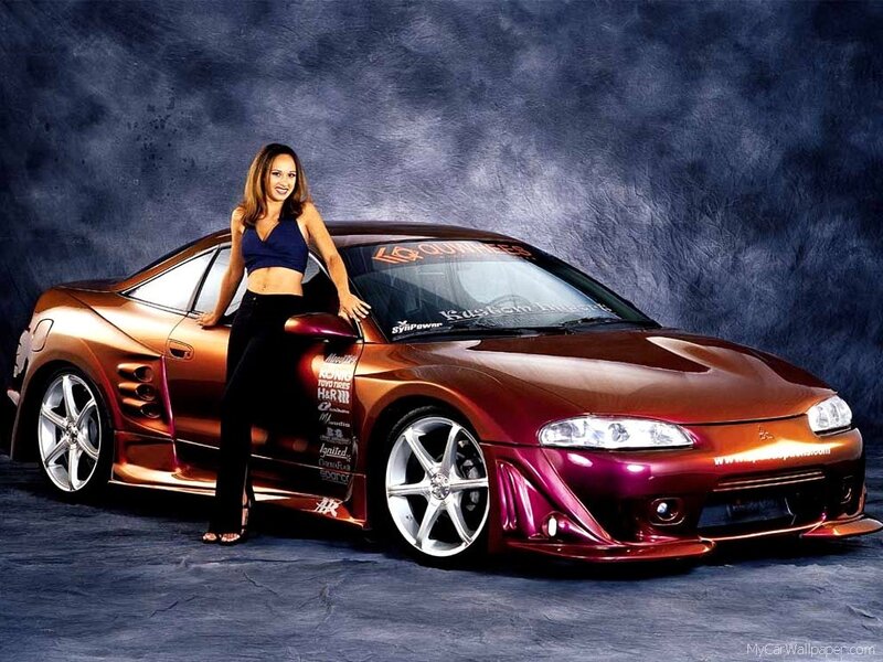 woman with custom sports car