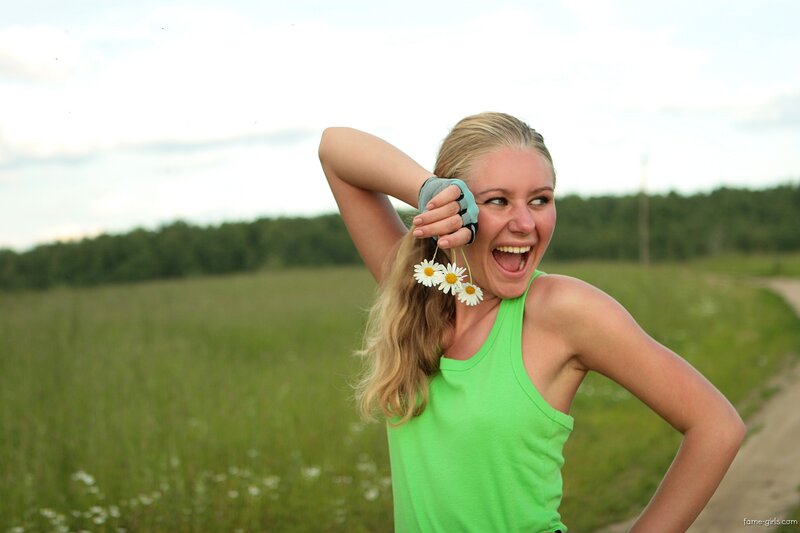 Woman with daisies in a field