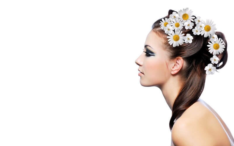 woman with daisies in hair