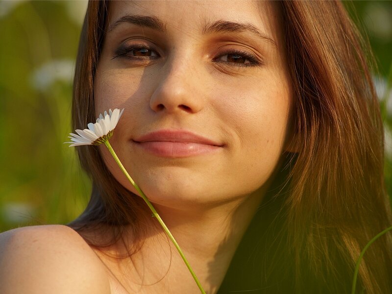 Woman with Daisy