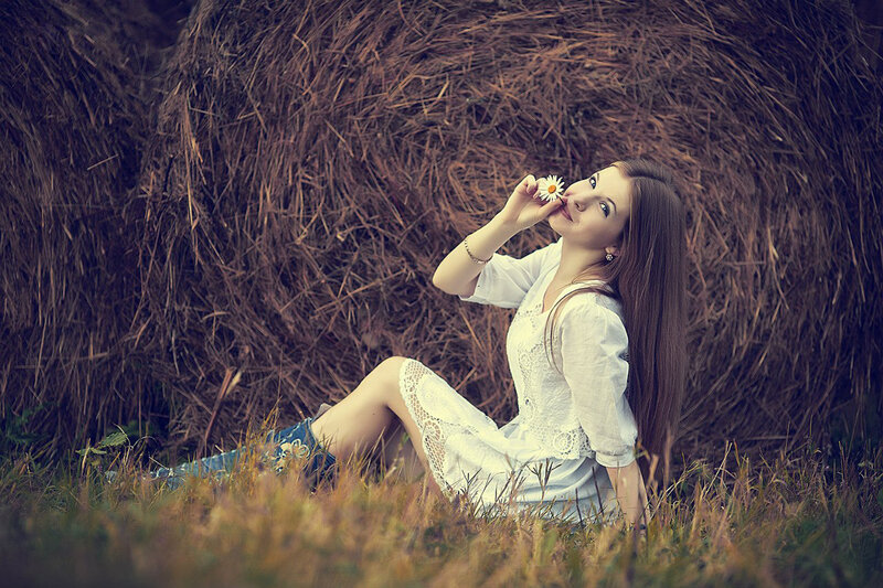 Woman with Daisy — White, Serene