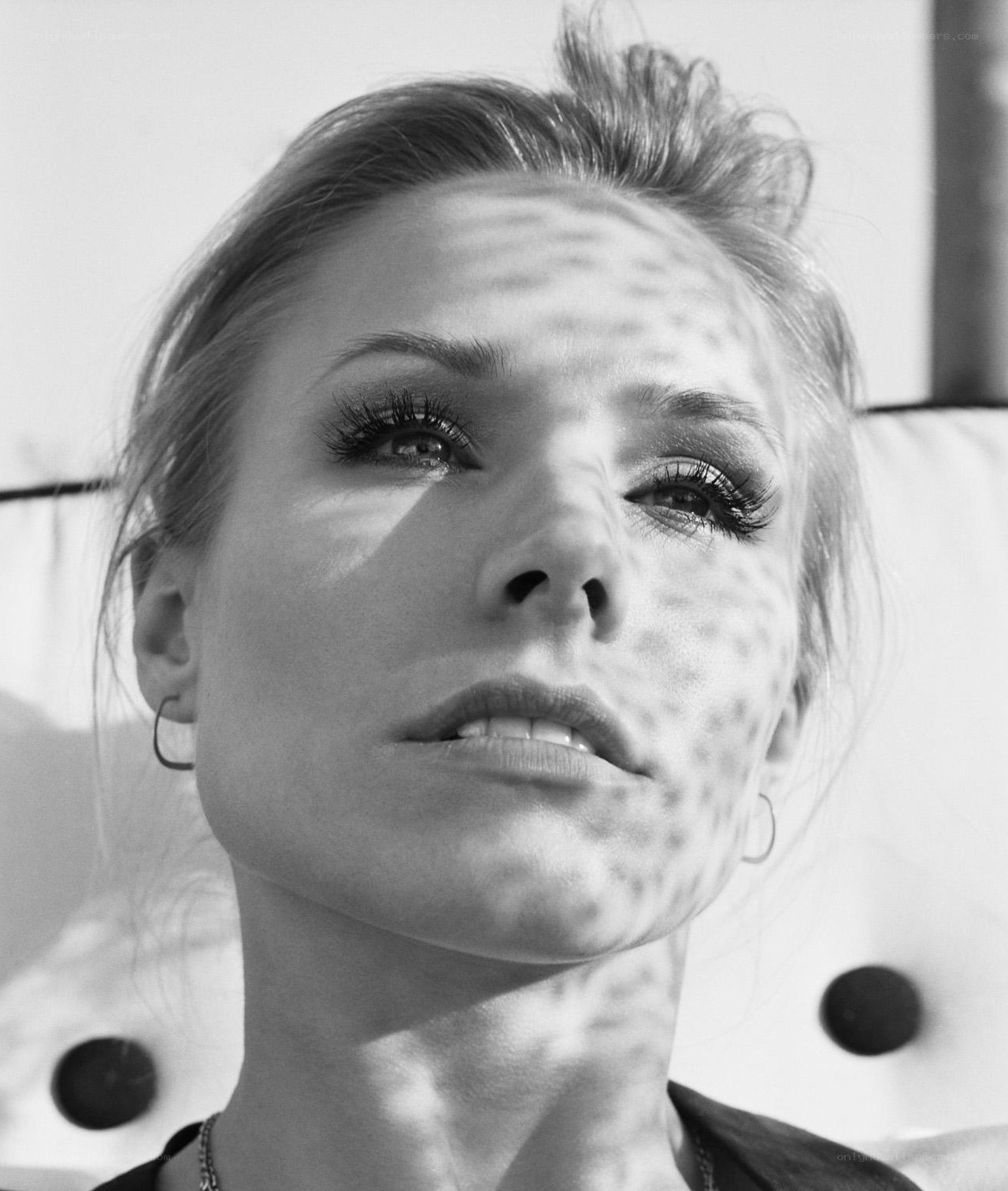 woman with dappled sunlight