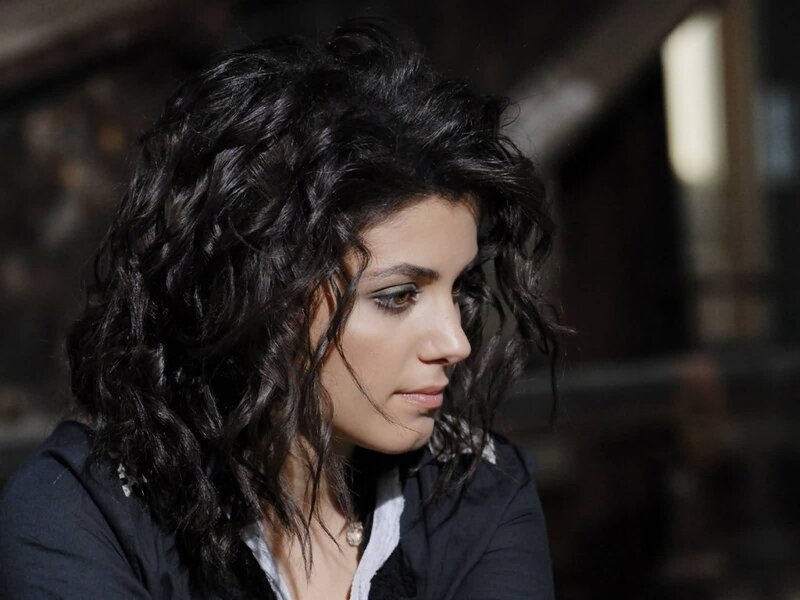 Woman with Dark Curly Hair — Black, Serious, Photograph