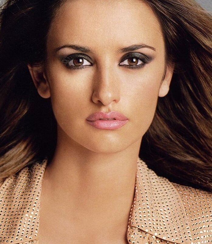 woman with dark eye makeup