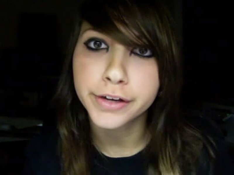 woman with dark eye makeup